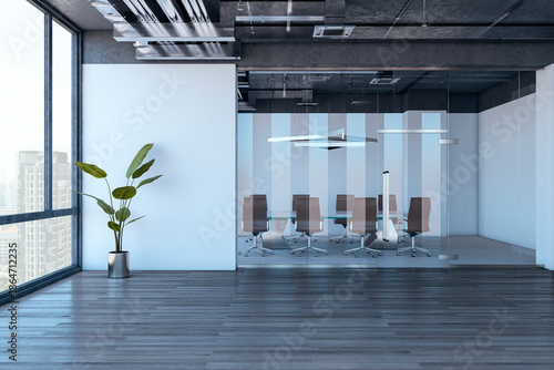 Quadro su tela Modern corporate meeting room with glass walls and city view in stylish office interior featuring loft ceiling and wooden floor design