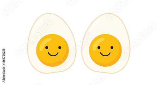 Two hard boiled egg halves placed side by side featuring cute smiling faces on the yellow yolks in a minimalist white setting.