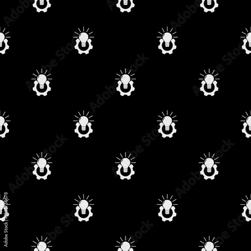 Cog light bulb seamless pattern isolated on black background