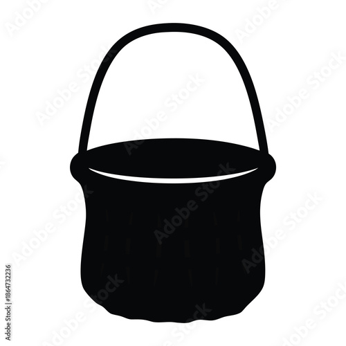 A silhouetted witch's cauldron with handle on a white background view