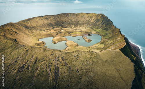Fotografie Aerial view of the unique caldera on the top of Corvo Island during sunny day wi