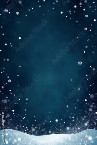 Beautiful winter background with falling snowflakes and snowy ground for seasonal designs