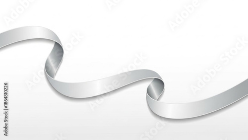 A silver ribbon curls and twists on a plain white background with subtle shadows adding depth to the metallic surface with curling with luxury
