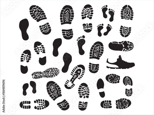 Collection of diverse shoe prints and footprints on white background