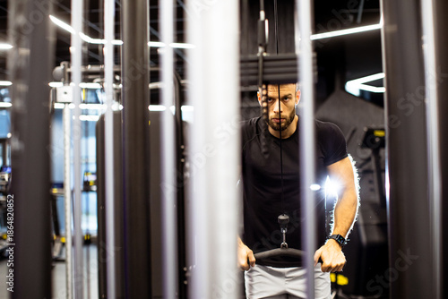 Man working out at the gym ...