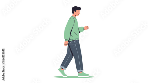 Young man walking casually dressed in a green hoodie and dark jeans on a plain white background