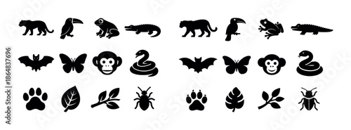 Silhouette icons of jungle animals and leaves