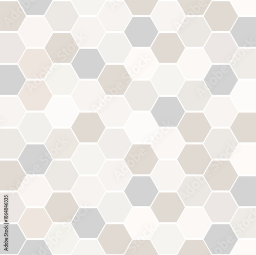Seamless hexagon grid filling the frame each cell in muted gray beige and white. Soft low contrast colors with thin white outlines create a clean calm modern minimalist.