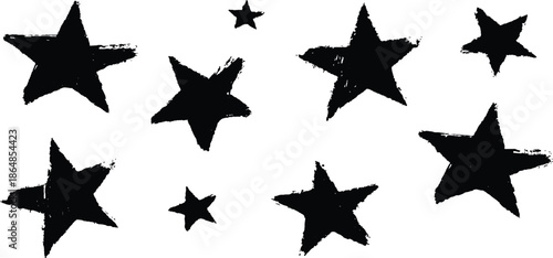 A simple, grunge-style pattern of black stars on a white background. A hand-drawn, grunge-style pattern featuring various sizes of black stars on a simple white background. 