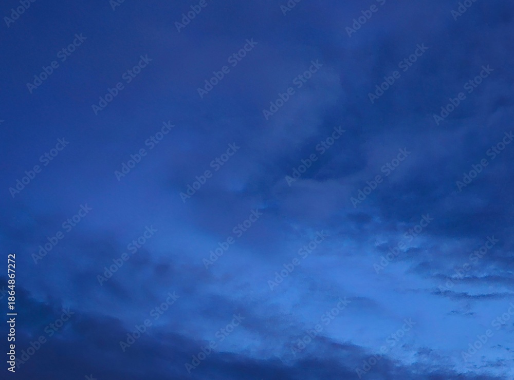 Obraz premium storm clouds timelapseDark blue afternoon sky with grey clouds.Dark blue sky in evening after sundown