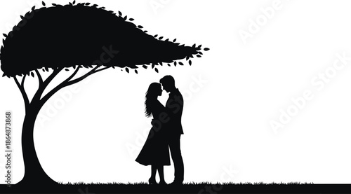 Silhouette of loving couple embracing beneath large spreading tree on grassy ground at night