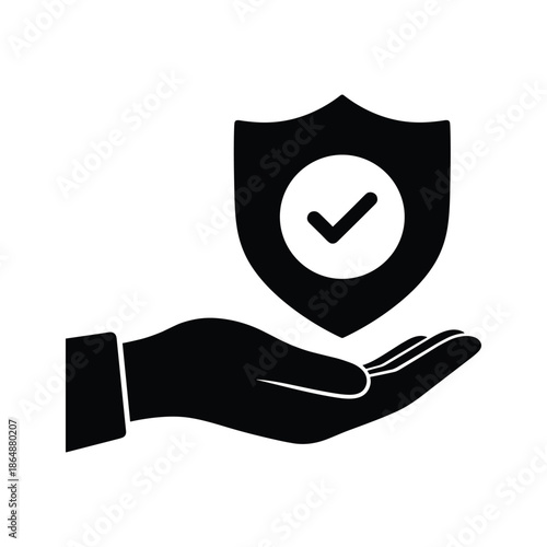 Protection and security with a hand holding a shield