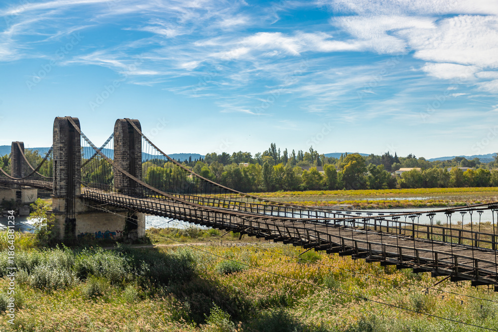 Fototapeta premium Old bridge over Durance river close to Mallemort, France