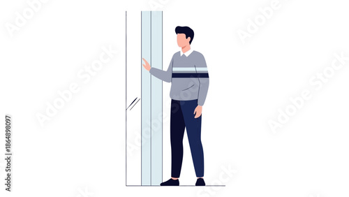 Young man waiting patiently outside elevator in modern building interior