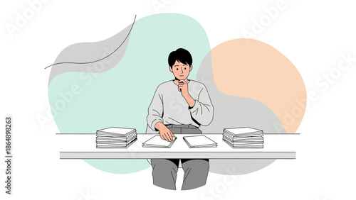 Young man working at a cluttered desk with stacks of papers and notebooks in a minimalistic setting