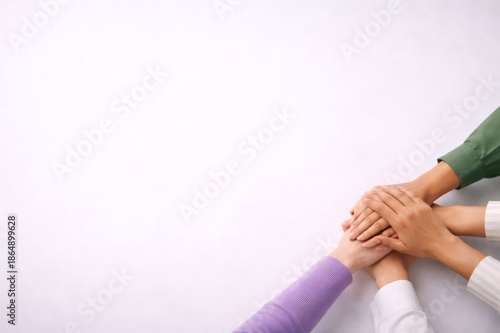 Women joining hands celebrating female power and unity