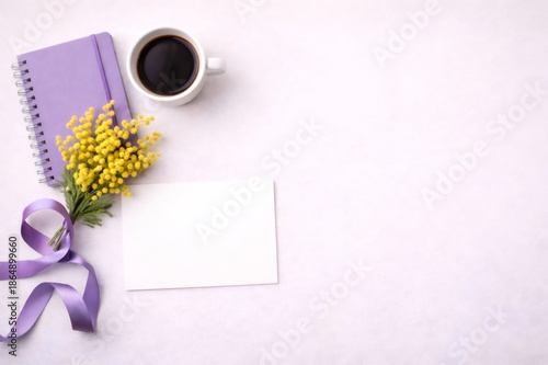 Mimosa flowers, notebook, coffee, card for celebrating women's day