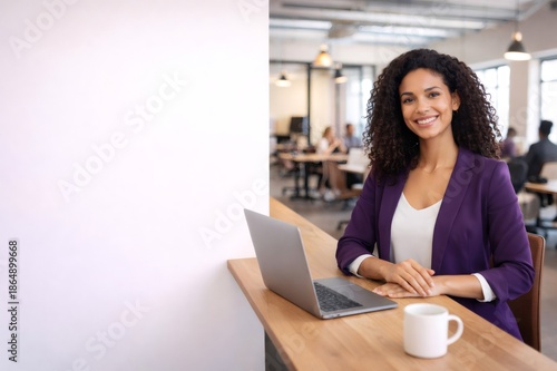 Professional woman smiling in modern office workplace