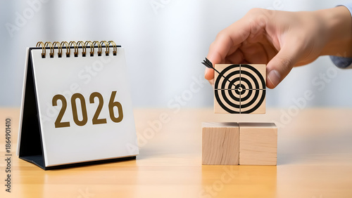 Setting goals for 2026 with a dart hitting the target