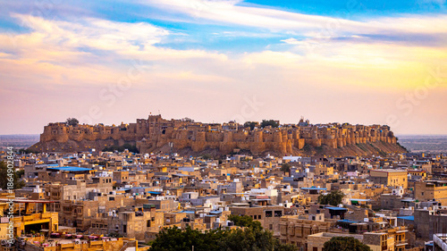 Panorama of Jaisalmer Fort - one of the largest forts in the world, known as the Golden Fort Sonar quila on sunset. Jaisalmer, Rajasthan, India