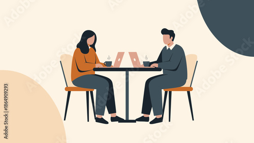 professional colleagues engaged in a discussion at a modern office table with laptops and coffee