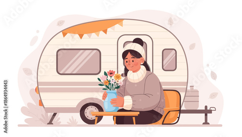 Woman Enjoys The Outdoors In Front Of Her Cute Trailer With Her Bouquet
