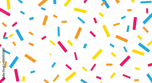 Vibrant colorful sprinkles scattered on white background for decorative pattern use.