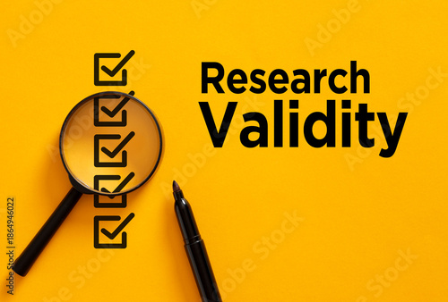 Photos Research validity checklist magnifying glass verification theme