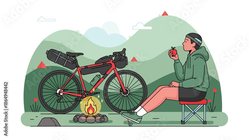 Adventurer On Bicycle Tour Eating Apple At Camp With Scenic Mountain Backdrop