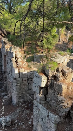Remains of building walls in the ruins of the ancient city of Phaselis in Lycia in modern Turkey.