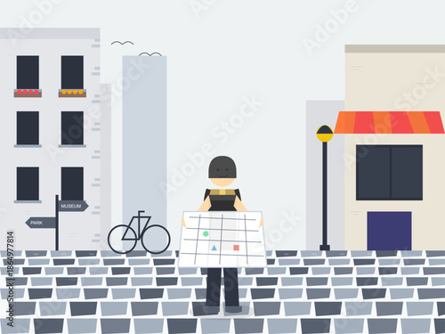 Person holding a map in a city street with buildings and street elements during daytime