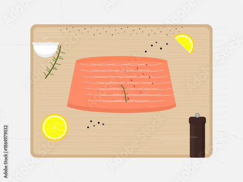 Salmon fillet preparation on a wooden cutting board with herbs and lemon slices