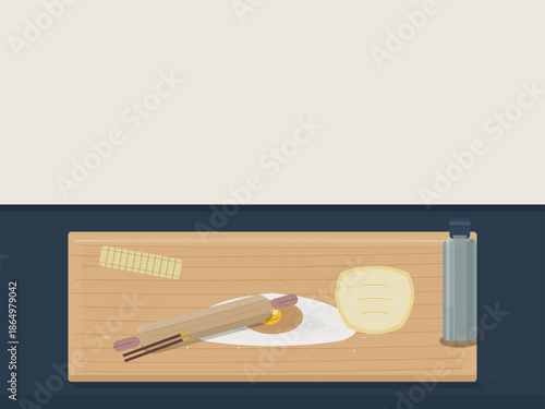 Baking lesson with wooden utensils and fresh ingredients on a kitchen table during daytime
