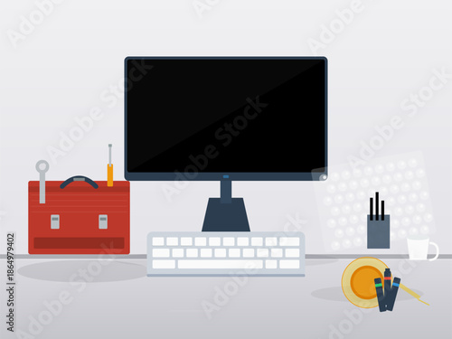 Home workspace setup with computer, tools, and stationery on desk in bright environment