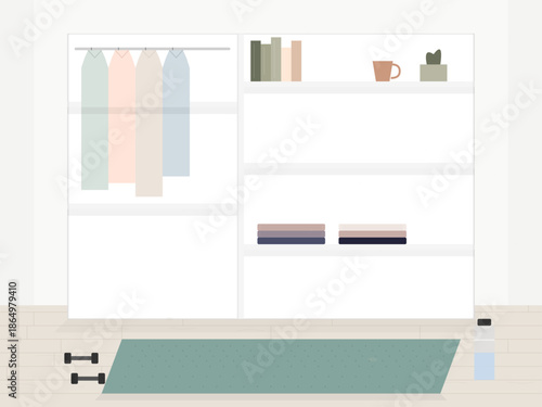 Clean and simple storage space with clothes, shelves, and exercise mat in a bright room