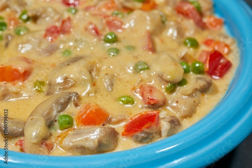 Obraz na plátne Chicken ala King, a classic American dish, served in a bowl.