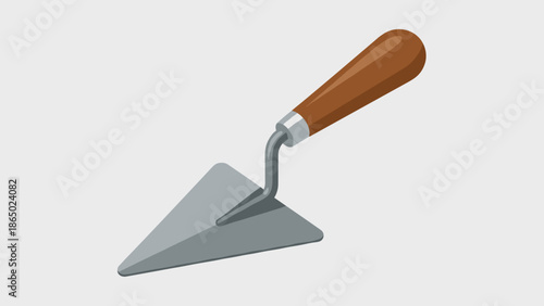Trowel with wooden handle and metal blade.