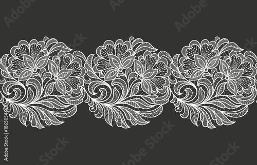 Seamless floral background with lace flowers and leaves.Vector hand made white lace ribbon with flowers