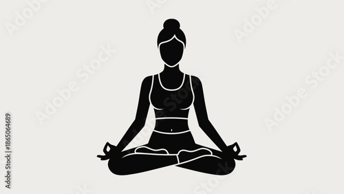 Silhouette of a woman meditating in a lotus yoga pose, illustrating peace and mindfulness.