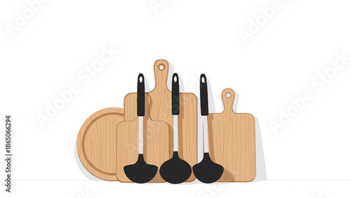 Collection of wooden cutting boards and kitchen ladles, representing cooking, food preparation, and essential kitchen utensils for culinary tasks.