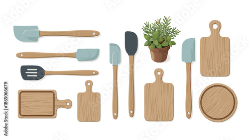 Assortment of wooden cutting boards and silicone spatulas, along with a potted herb, representing cooking, food preparation, and essential kitchen tools.