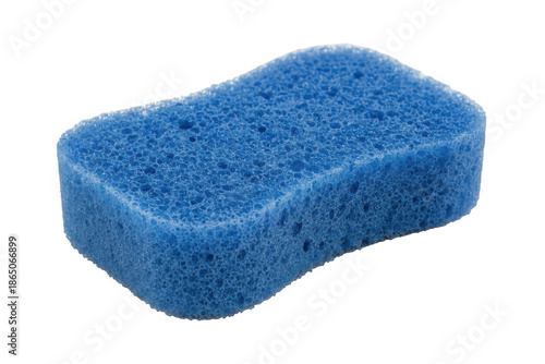 Close-up of a blue sponge with a soft, porous texture, isolated on a blue surface