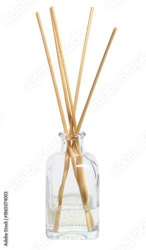 Glass aroma diffuser with wooden sticks on isolated background