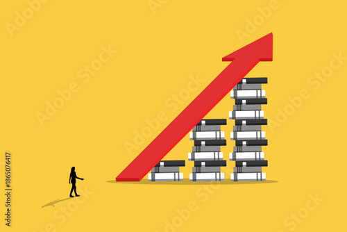 business woman standing in front the books. concept of success, education level and skill development