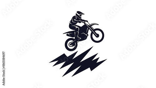 Black and white illustration depicts a motocross rider in action. The rider, on a dirt bike, is mid-air, over a jagged shape