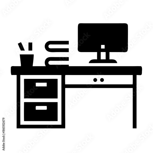 Modern home office desk setup with computer, books, and stationery essentials