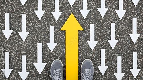 A person standing at a crossroads with a crowd following opposite directions