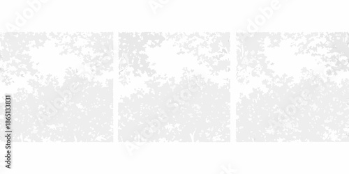 Abstract white triptych with textured speckled patterns and minimalist design