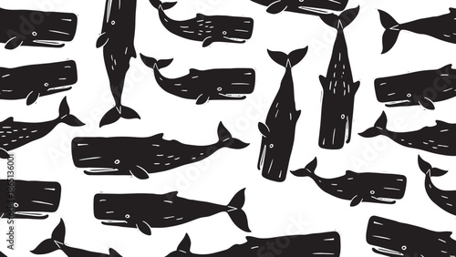 Collection of various whale silhouettes swimming in different directions