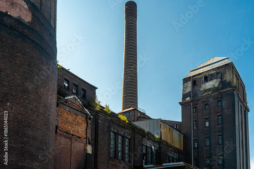 Abandoned factory buildings with chimney